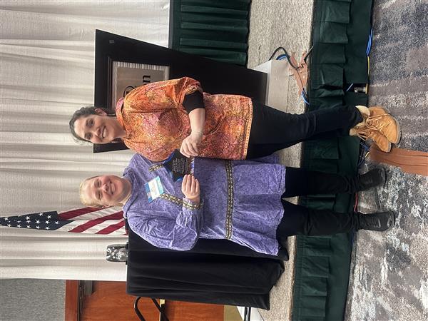  Mary and Lacy holding award